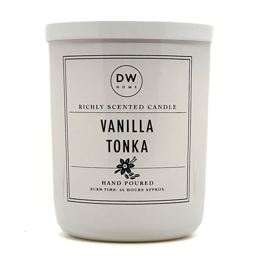 A white glass jar candle with a white lid and a clean white label that reads 'DW HOME' and 'VANILLA TONKA' on a plain white background.