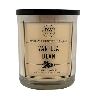 A DW Home 744g Vanilla Bean scented candle in a clear glass jar with a black lid and a cream-coloured label, shown against a plain white background.