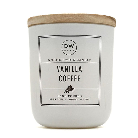 A white ceramic jar candle with a light natural wood lid, featuring a white label with black text that reads 'DW HOME' and 'VANILLA COFFEE'.