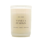 A frosted glass jar candle with creamy off-white wax, featuring a white lid and black text that reads 'DW HOME VANILLA PUMPKIN' on the front label.