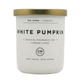 A white scented candle jar with a metallic gold lid, labeled 'WHITE PUMPKIN' by DW HOME | ESSENCE, on a plain white background.