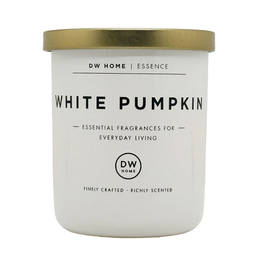A white scented candle jar with a metallic gold lid, labeled 'WHITE PUMPKIN' by DW HOME | ESSENCE, on a plain white background.
