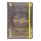 A hardcover journal titled 'Wuthering Heights Journal' with an ornate embossed cover in dark gray and gold, featuring a bright yellow elastic closure band, shown on a plain white background.